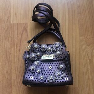 Zac Posen Eartha small crossbody bag in Berry/Sphinx.